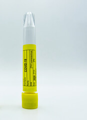 Test tube with covid-19 test label isolated on white background. Copyspace blank space
