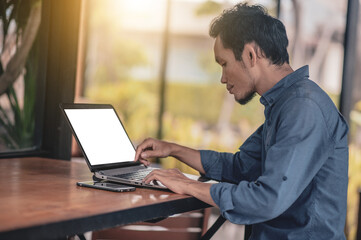 Asian man use computer freelancer working from home,Concept business technology