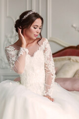 Fototapeta premium Close-up portrait of the bride with tiara with crystals