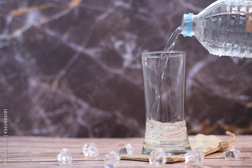 Poster water pouring into glass