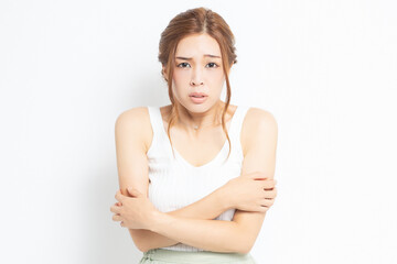 体調不良の若い女性