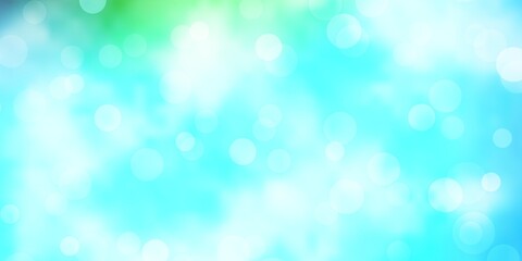 Obraz premium Light Blue, Green vector backdrop with dots. Abstract decorative design in gradient style with bubbles. Pattern for websites.