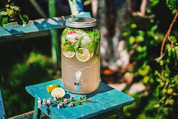 Catering service. Drinks on summer party. Big bottle of lemonade.