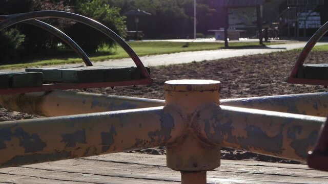 During a pandemic, the playground carousel is empty