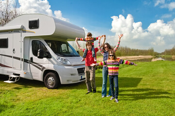 Family vacation, RV travel with kids, happy parents with children have fun on holiday trip in...