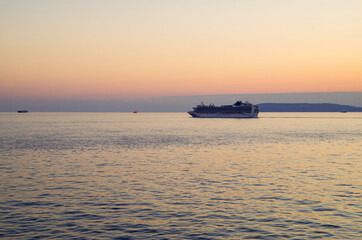 Dream cruise on luxury modern cruiseship or cruise ship liner at sea during sunset or sunrise or...