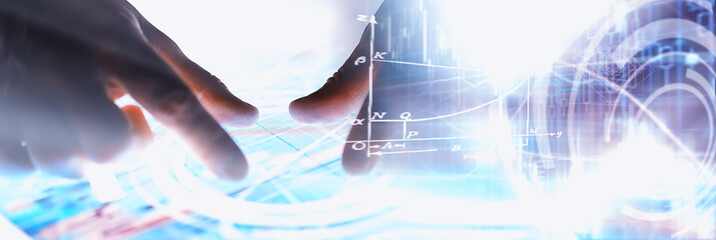 Business concept. Information technology and data processing. Hands over the screen with graphic data. A modern software product in business.