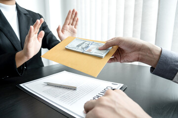 The businessman denies the money in proposed by his partner to bribe the concept of bribery and corruption