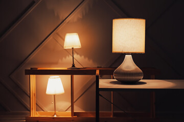 Glowing lamps in dark room