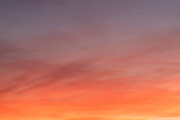 Naklejka na ściany i meble Red orange sunset coloured sky.