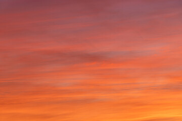 Red orange sunset coloured sky.