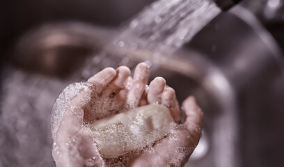 Fototapeta premium Hygiene rules. Hand washing before meals. Antibacterial treatment of hands with soap. A way to prevent virus infection. Coronavirus protection.