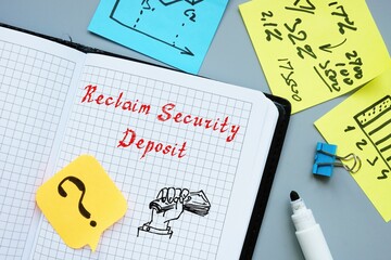 Business concept meaning Reclaim Security Deposit with sign on the piece of paper.