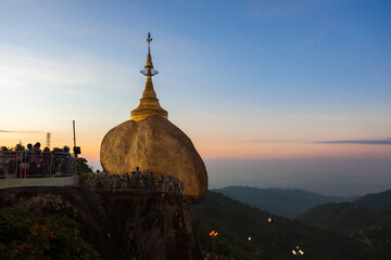 Kyaiktiyo Pagoda. Famous golden rock pagoda in Myanmar at sunset. Beautiful buddhist stupa in Myanmar.