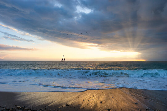 Ocean Storm Sunset Sailboat Sun Beams