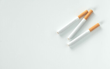 three of cigarette isolated on white background