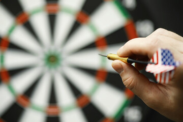 Darts. The dart for playing in the game board is stuck. Hit the sector in darts. The concept of a...