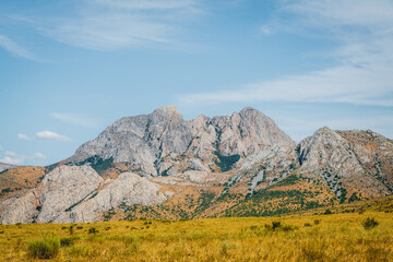 Fototapeta premium Mountains in the steppe, the Karatau mountain range. South Kazakhstan