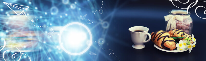 French breakfast on the table. Coffee croissant with chocolate and a decanter with cream. Fresh pastries and decaffeinated coffee.