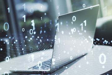 Creative concept of binary code illustration on modern laptop background. Big data and coding concept. Multiexposure