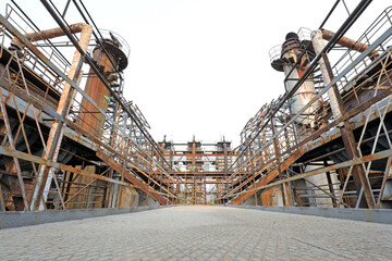 Unused and abandoned metal pipes in factories