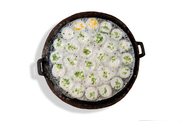 Kanom Krok or Kind of Thai sweetmeat, Thai dessert on a tray ,Making candy on white background..