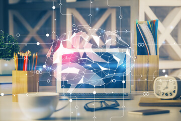 Double exposure of work space with computer and human brain drawing hologram. Brainstorm concept.
