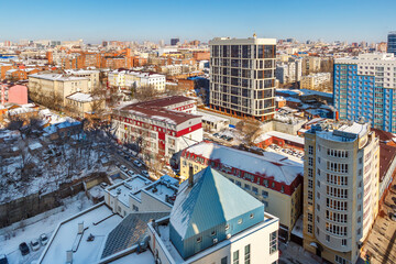 The aerial wintertime landscape of the city with residential multistory buildings. Rostov-on-Don, Russia