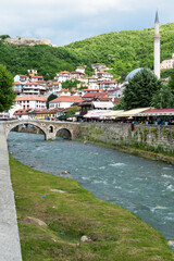 Bistrica river with stone bridge and fortress dominating Prizren, Kosovo
