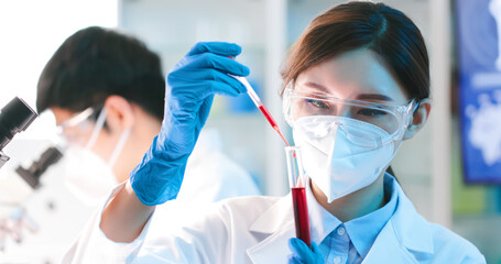 medical worker take test tube