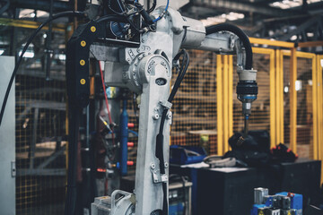 robot arm working in factory