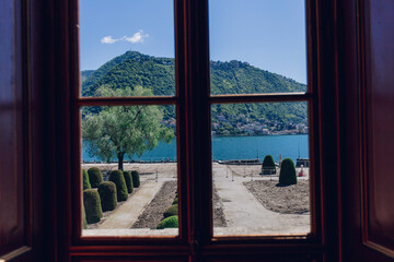 view of the mountains and the lake from the window