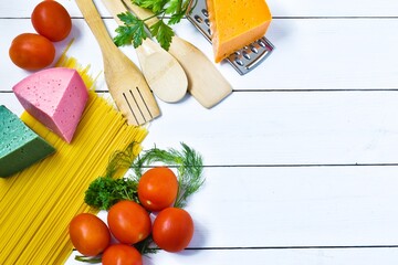 Image of cooking ingredients on white background. Pasta collection.Top view. Vegetarian food, health or cooking concept.