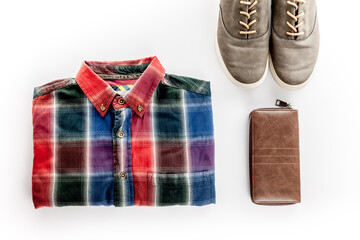  The concept of men's clothing and accessories. Check shirt, wallet, shoes on white background top view flat lay copy space