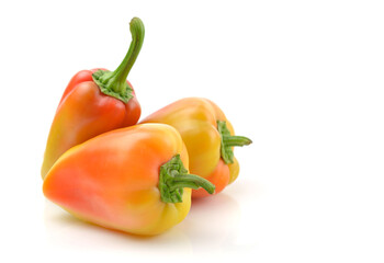 colored sweet pepper close-up on a white isolated background, space for text.horizontal view