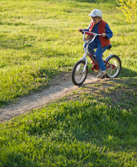 Fototapeta na wymiar boy riding a bike