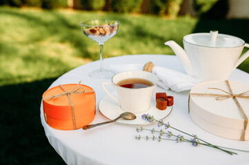 Table setting, tea party with sweets, top view