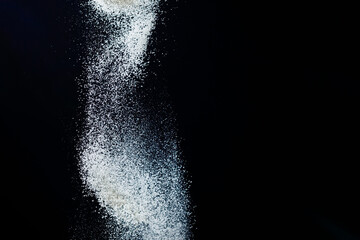 Abstract design of white powder cloud isolated on black, dark background. Abstract design of white dust cloud. Particles cloud screen saver, wallpaper.