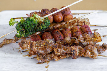 Pictures of grilled pork with spicy hot and spicy Szechuan pepper sauce, local street food and spicy Thai foo