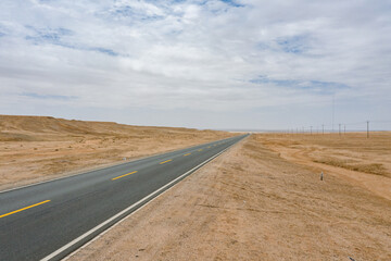 aerial view of  road in the desert