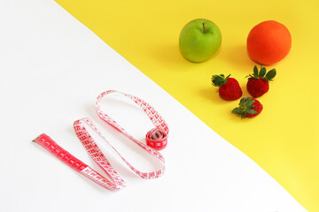 centimeter tape and fruit, Apple, orange and strawberry