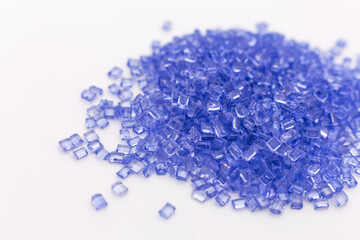 Blue Color UV policarbonat raw materials granules close up. Hollow Sheet Panel Plastic Production