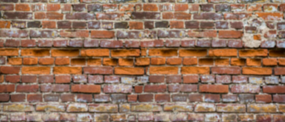 Blur background of old red brick wall 
