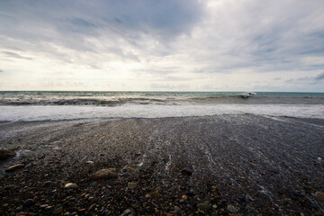 Stormy weather, waves and splashes in Batumi, Georgia. Stormy Black sea.