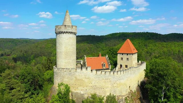 Aerial view of medieval castle Kokorin nearby Prague in Czechia. Central Europe. Medieval gothic castle Kokorin, Kokorinsko protected landscape area in Czech Republic. Medieval gothic castle Kokorin.