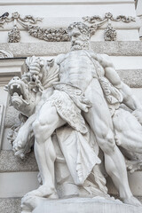 Statue of Hercules fighting Cerberus, a multi-headed dog beast that guards the gates of the Underworld from Classical Greek Mythology, Hofburg Palace, outdoor, Vienna, Austria, details, closeup