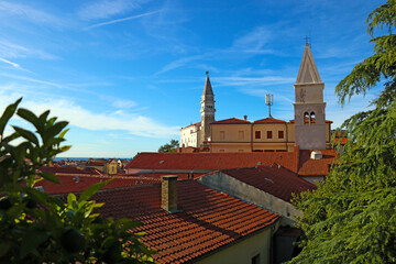 Nice view of the red tiled roofs of houses in the old town.