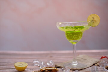 Cocktail on wooden background and space for text 