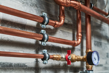 Plumbing service. copper pipeline of a heating system in boiler room