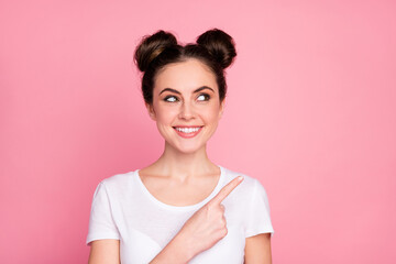 Close-up portrait of her she nice-looking attractive lovely charming pretty cute cheerful cheery girl demonstrating copy space ad decision isolated over pink pastel color background